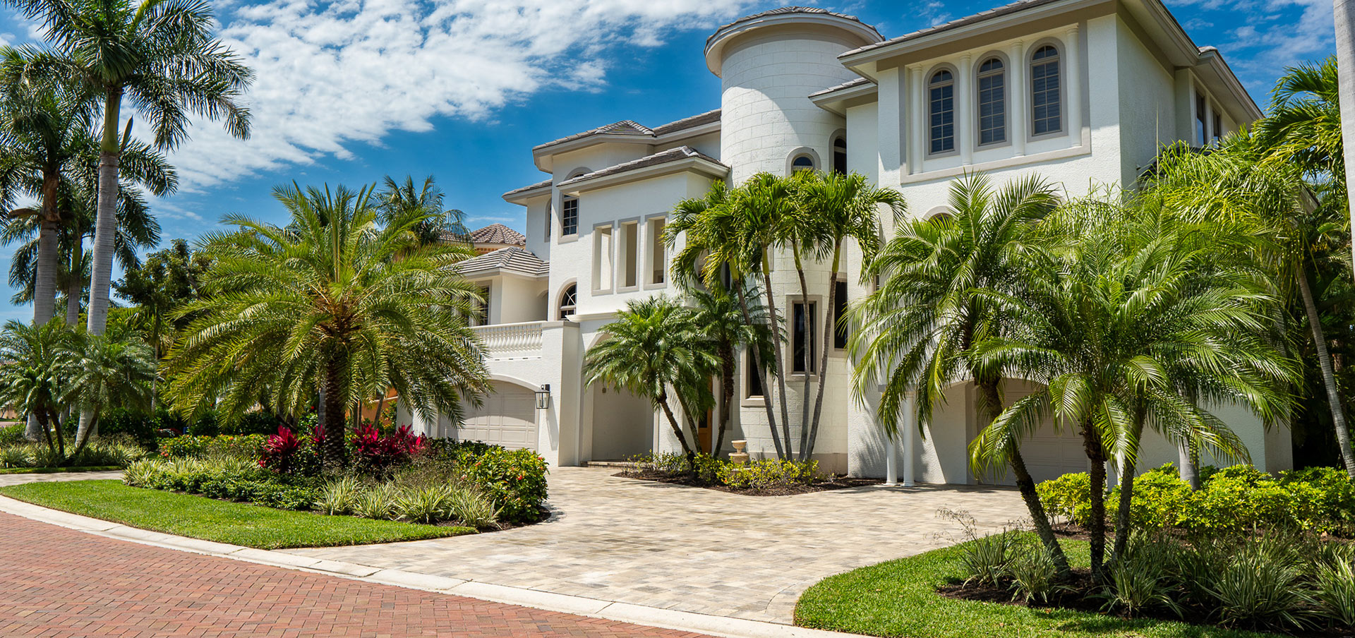 Front elevation custom paver driveway installation by Compact Pavers, Inc. | SWFL Paver Company
