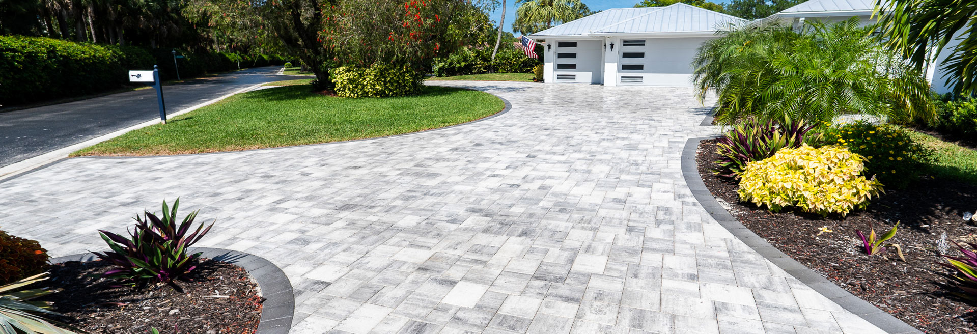 Modern Home Paver driveway project completed by Compact Pavers Services for SWFL